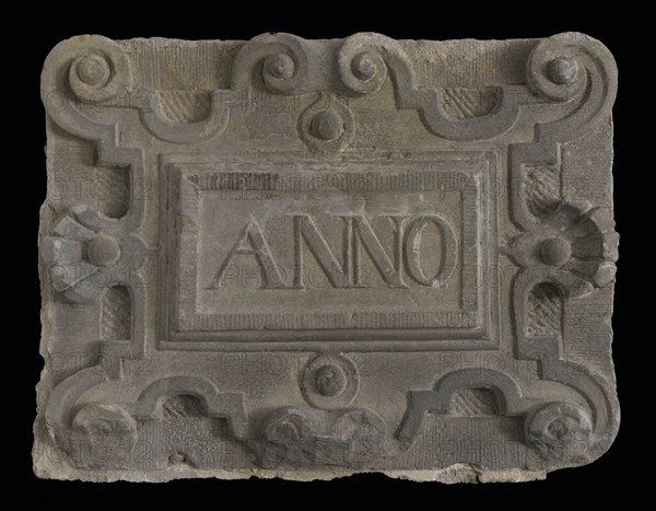 Facade stone with text ANNO from the facade of watchmaker William Gib, facing stone sculpture sculpture building component