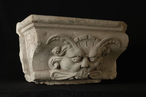 Console with devil's head, console building element sandstone stone, sculpted Top with red ink: (unreadable) 1919 Rotterdam City