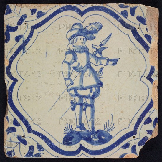 FI of EI of FL (?), Figure tile, blue on white, warrior on ground inside frame with braces, corner motif, wall tile