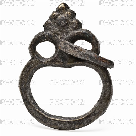 Brass or bronze closure of belt with three eyes, remnant of batter, buckle belt part clothing accessory clothing soil find