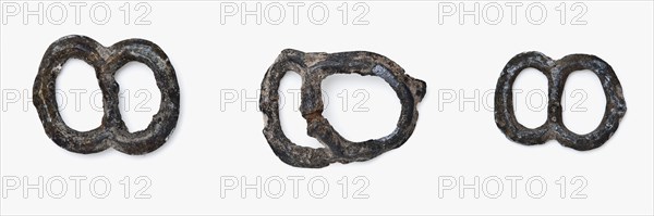 Three pewter ornamental buckles with two oval eyes, clasp fastener component soil find tin metal largest, cast Three pewter