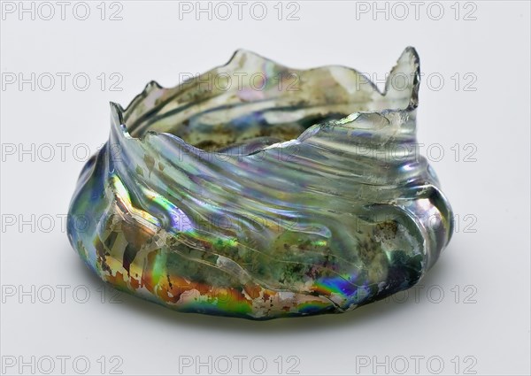 Fragment of foot, bottom and part wall of corrugated cup, drinking glass drinking utensils tableware holder soil find glass