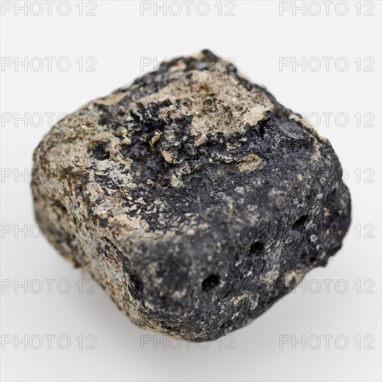 Rectangular block of lead, holes in the sides, artifact soil find lead metal, gram cast Rectangular block of metal Rows of holes