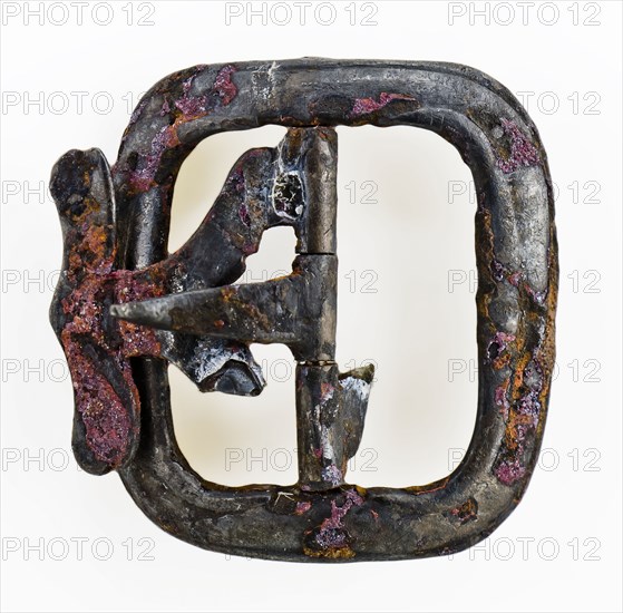 Shoe buckle, rectangular bracket with middle post with angel and bounce, buckle fastener component soil find tin? metal