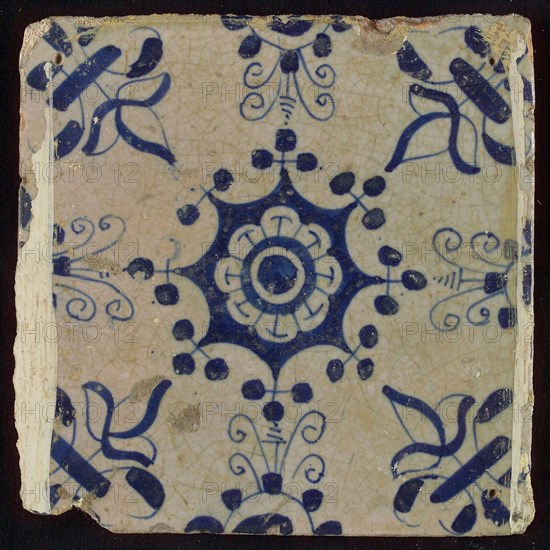 Tile, blue on white, central flower within star shape, three-piece around, half rosette, corner pattern lily, wall tile