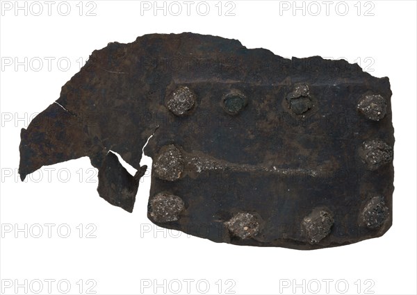 Rectangular torn fragment with batter, probably from cooking pot, batter soil find copper metal, whipped riveted Piece copper