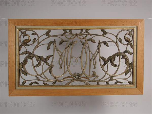 Top light with cut monogram amidst vines with leaves, in new frame, cutting window surface light wood carving sculpture visual