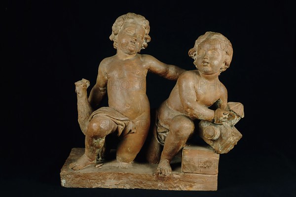 Terracotta statue of two children, one with cock, the other with lantern in their hands, personifications of Day and Night