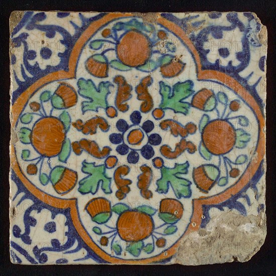 Tile, blue pull, orange, brown and green on white, centrally rosette above which orange-pineapples and marigolds, four-sided