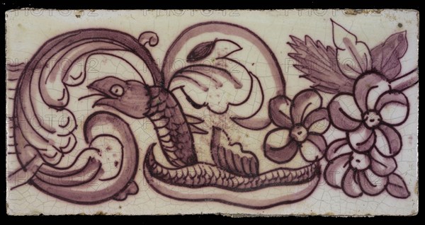 Rectangular edge tile in purple with hinged decor of leaves, flowers and twisted snake with scales and fin, border tile wall