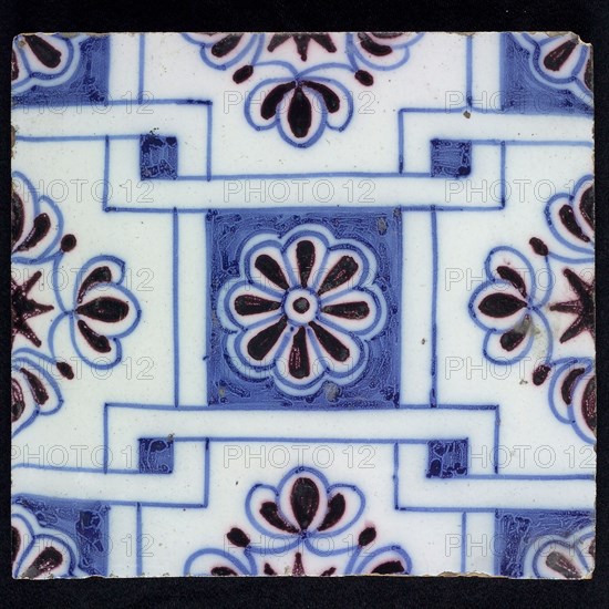 Ornament tile, blue on white, central square decor with purple rosette, along two blue diagonals diamond pattern, with flowers