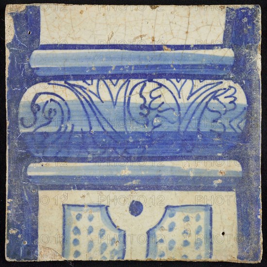 Tile of chimney pilaster, blue on white, part of pillar with basement with floral decoration, division with dots, chimney