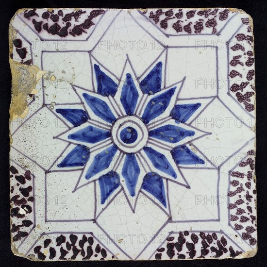 Sprinkled ornament tile, center double circle, double eight-pointed blue star, against background of two white eight-pointed