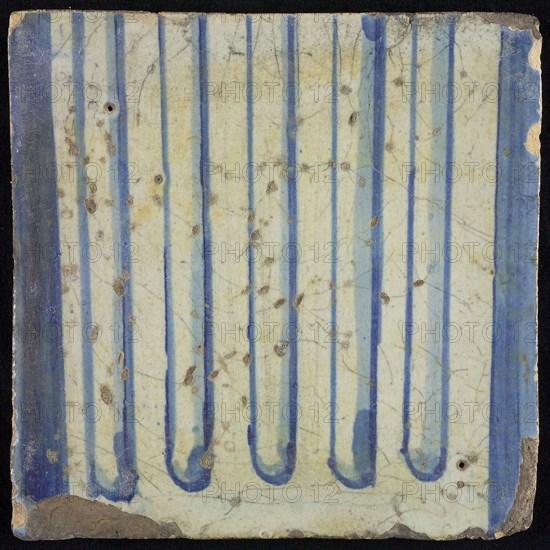 Tile of chimney pilaster, blue on white, part of column with cannelure, chimney pilaster tile pilaster footage fragment ceramics