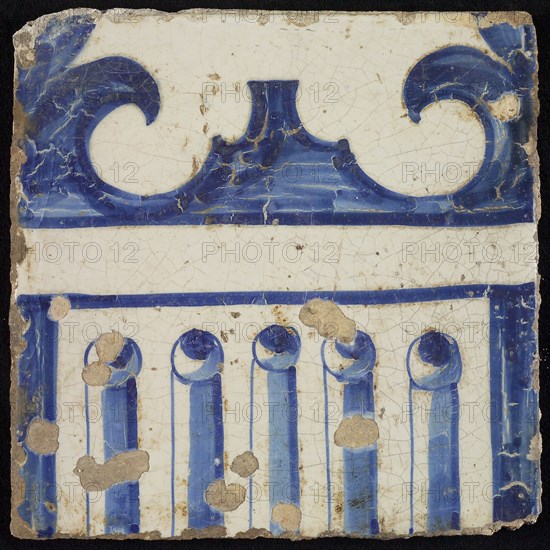 Tile of chimney pilaster, blue on white, part of column with cannelure and capital on which curly ornament, chimney pilaster
