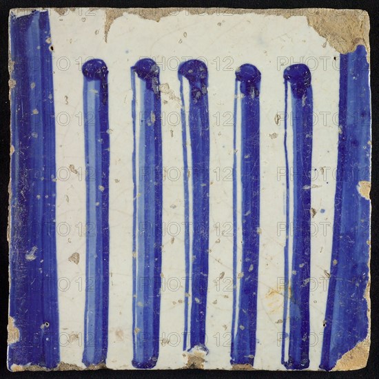 Tile of chimney pilaster, blue on white, part of column with cannelure, chimney pilaster tile pilaster footage fragment ceramic