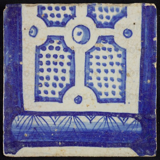 Tile of chimney pilaster, blue on white, bottom of column with basement, compartment with dots, chimney pilaster tile pilaster