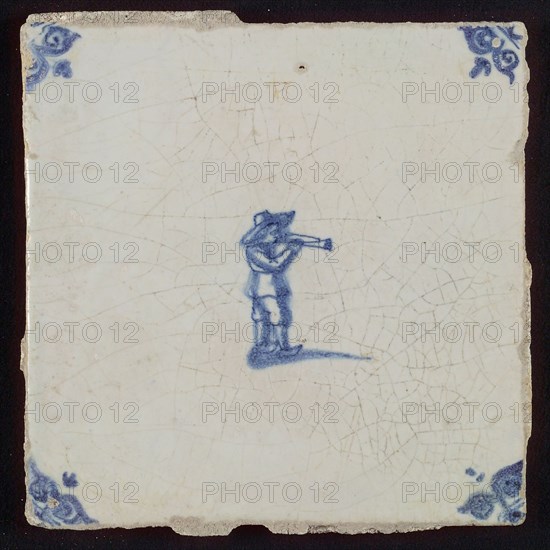 Scene tile, child's play, making music, trumpet, corner motif ox's head, wall tile tile sculpture ceramics pottery glaze tin