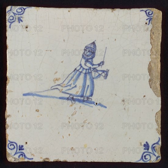 Scene tile, child's play, hobbyhorse, corner motif ox's head, wall tile tile sculpture ceramic earthenware glaze tin glaze