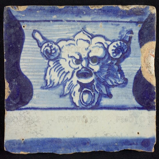 Tile of chimney pilaster, blue on white, part of column with base on which horned lion's head with ring, chimney pilaster tile