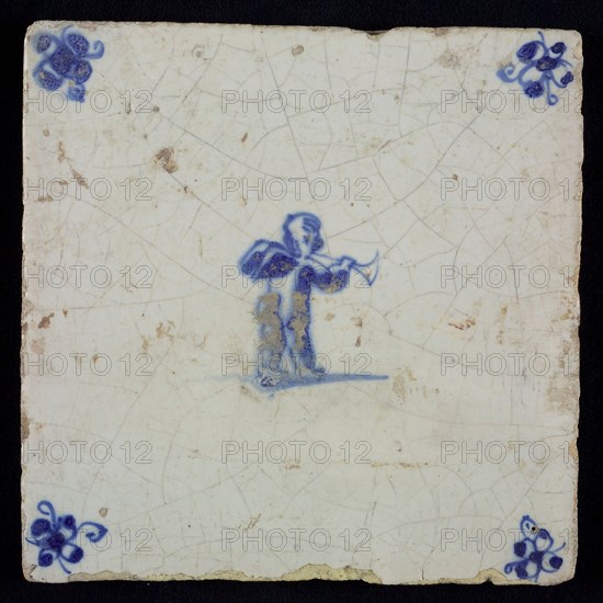 White tile with blue putto with wind instrument; corner motif spider, wall tile tile sculpture ceramics pottery glaze, baked 2x