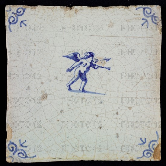 White tile with blue putto with wind instrument; corner pattern ox head, wall tile tile sculpture ceramic earthenware glaze