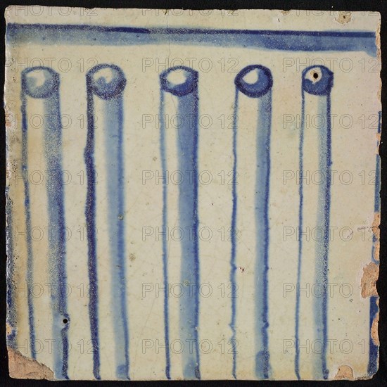 Tile of chimney pilaster, blue on white, part of column with cannelure, chimney pilaster tile pilaster footage fragment ceramics