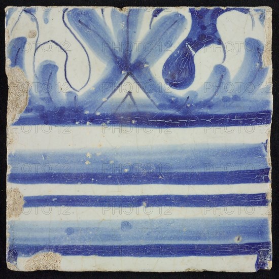 Tile of chimney pilaster, blue on white, part of column with capital, chimney pilaster tile pilaster footage fragment ceramic