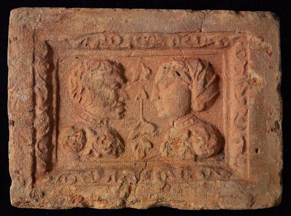 Hearthstone, Luiks, from Luik, Liege Belgium, with wide frame, with male and female head, hearth fireplace part ceramic brick