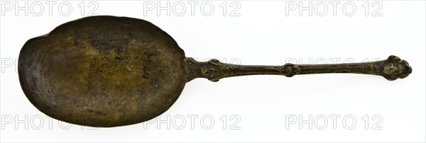 Brass spoon with oval bowl, engraved floral motifs, carved stem with male head, spoon cutlery soil find copper metal, poured