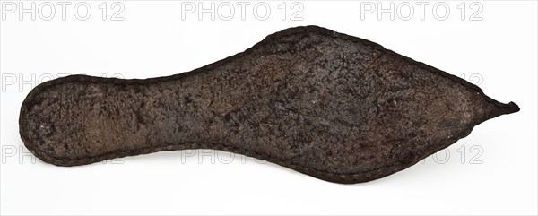 Sole of pointed leather shoe with stitching along edges, sole shoe footwear clothing part soil find leather, archeology