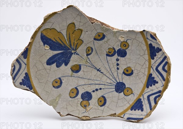 Fragment majolica dish with leaf figure in orange and blue, dish plate crockery holder soil find ceramic earthenware glaze tin