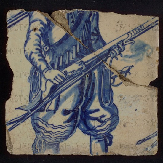 Tile of tableau with blue soldier's torso, tile picture footage fragment ceramics pottery glaze, baked 2x glazed painted Tile