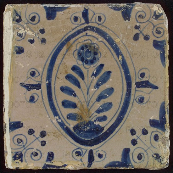 White tile with in blue flower in oval frame; corner motif triptych, wall tile tile sculpture ceramic earthenware glaze, baked