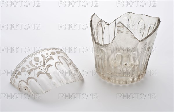 Two fragments of beakers, uneven ribs and floral motifs applied with engraving, cup drinking glass drinking utensils tableware