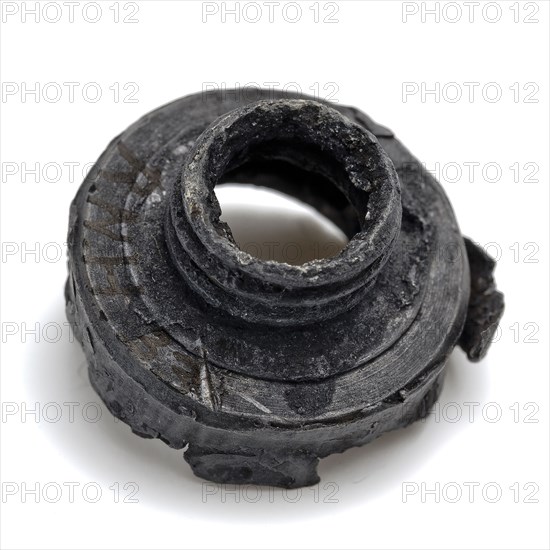 Bottle cap with narrowed neck with screw thread, cap closure part ground find lead metal, cast Part of lead cap with threaded