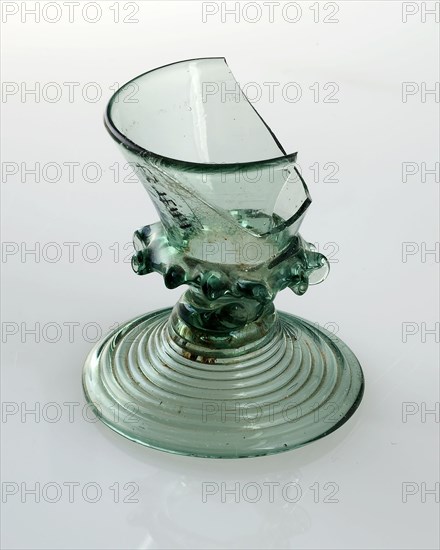 Fragment green (toy?) Chalice glass with drop edge under the center of the glass, drinking glass drinking utensils tableware