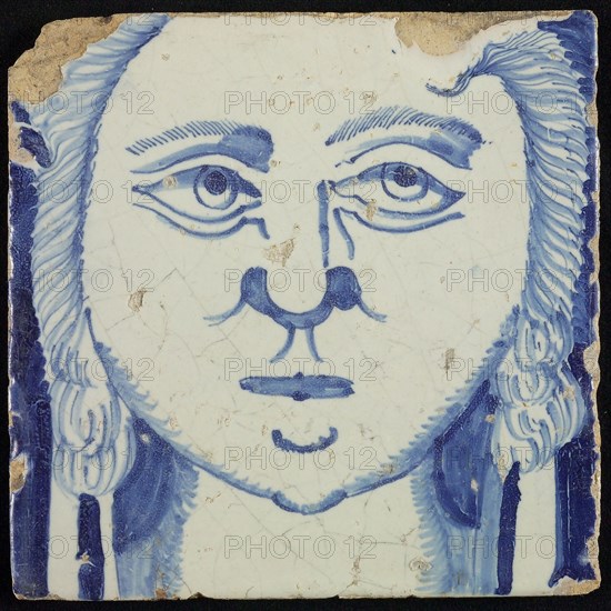 Tile of chimney pilaster, blue on white, head of woman with long curly hair, chimney pilaster tile pilaster footage fragment