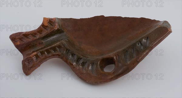Fragment of earthenware grease trap or pointed plate, edge fragment with gutter, grease trap baking utensil holder soil find