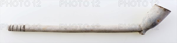 Clay pipe with simple band decoration on stem, clay pipe smoking equipment smoke floor pottery ceramics pottery, pressed