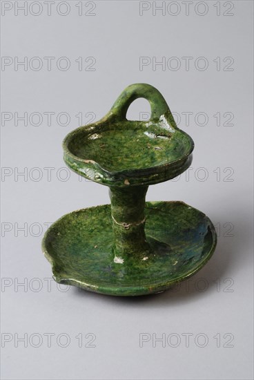 Green earthenware oil lamp with pouring lip and standing ear, two bowls with column between them, oil lamp lamp illuminant soil