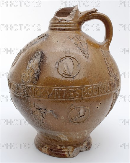 Stoneware jug, round belly frieze with text above and below portrait medallions and leaf motif, jug crockery holder soil find