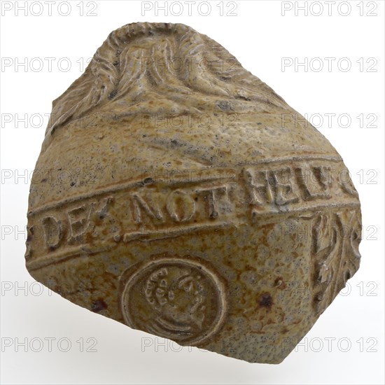 Light brown fragment of Bartmann jug, also called Bellarmine jug, frieze with text, Bartmann jugtableware holder fragment earth