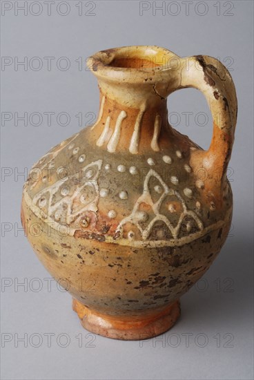 Pottery oil jug on stand with standing ear and silt decoration on the neck and shoulder, oil jug crockery holder soil find