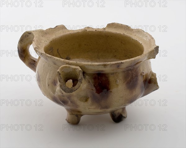 Pottery toy room pot, white shard, glazed in yellow and brown, two sausage ears, spout, on three legs, spout pottery pottery