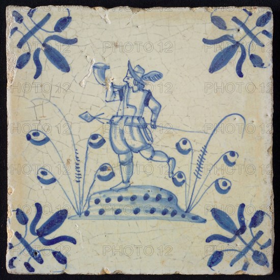 White tile with blue warrior, corner pattern lily, wall tile tile sculpture ceramic earthenware glaze, baked 2x glazed painted