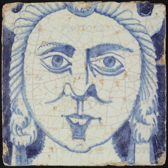 Tile of chimney pilaster, blue on white, head of woman with long curly hair, chimney pilaster tile pilaster footage fragment