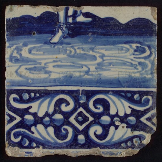 Tile of tableau with in blue feet and decorated border, tile picture footage fragment ceramics pottery glaze, baked 2x glazed