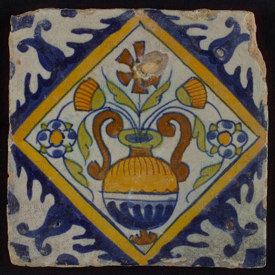 Tile, orange, brown, green, and blue on white, flowerpot in square, corner pattern palmet, wall tile tile sculpture ceramic