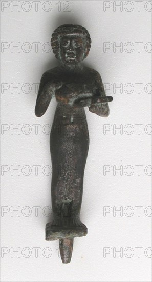 Statuette of a Priestess with Offering Table and Situla, Third Intermediate Period, Dynasties 22–25 (about 945–656 BC), Egyptian, Egypt, Bronze, 9.5 × 2.9 × 2.9 cm (3 3/4 × 1 1/8 × 1 1/8 in.)